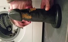Sucking a shitty dildo