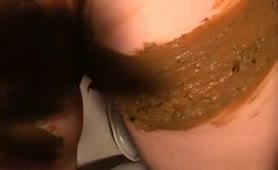 Brown shit on her entire body - awesome