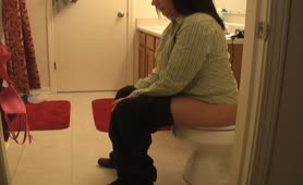 Brunette mature woman cleaning her ass