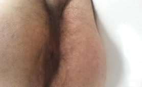 Hairy Italian boy pooping in close up