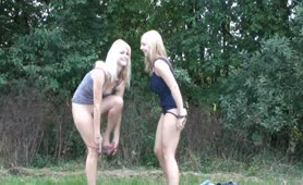 Two Swedish girls peeing outdoor