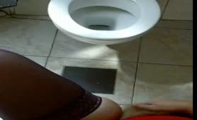 Naughty girl trying to pee from distance