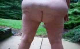 Fat wife peeing outdoor