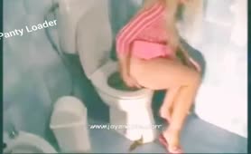 Blonde girl missed the toilet
