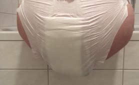 Ebony girl shitting in white diapers