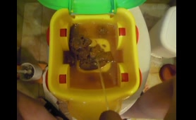 Babe Shits and Pisses on a Toy