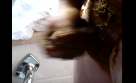 Slut squeezes out a crap load