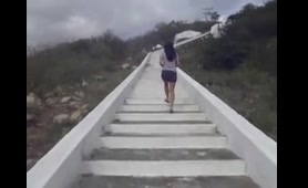 Woman Craps in Rocks