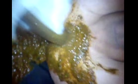 Woman Shits on Dildo