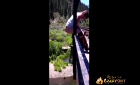 Man Shits from Bridge