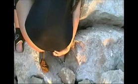 Lady Shits on the Rocks