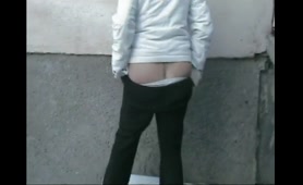 Woman poops outside her home