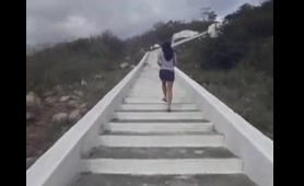 Sexy Babe Pees on the Rocks