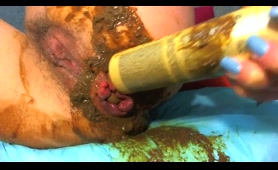 Woman Shits with Shampoo Bottle