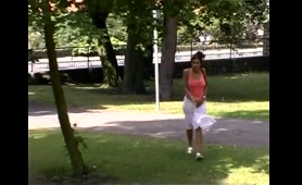 Sexy Chick Pees by a Tree