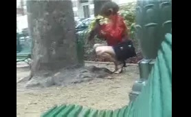 Woman Pisses on Public Street