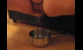 Amateur Lady Pees in a Pan