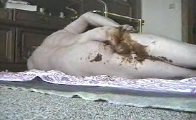 Smearing poop on his shaved balls