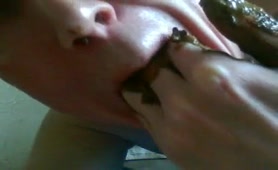 Licking poop from his shitty fingers