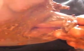 Teen boy rubbing crap on his face to eat it all