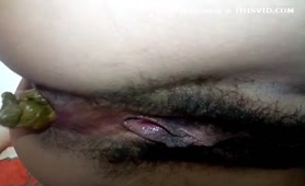 Hairy babe shitting over toilet