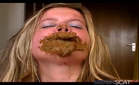 Blonde milf smears crap on her entire face