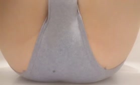 Shitting a lot in grey panties