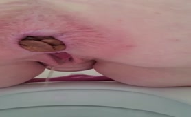 Chubby wife shits over toilet