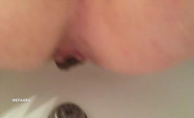 Sexy wife shitting in close up