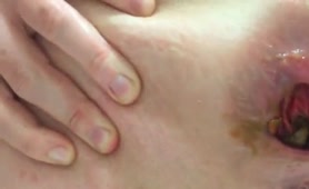 Pushes out a huge turd